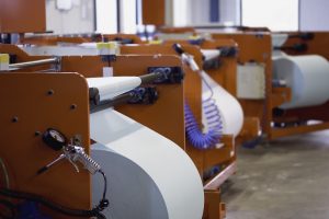 Row of winding machines in factory setting